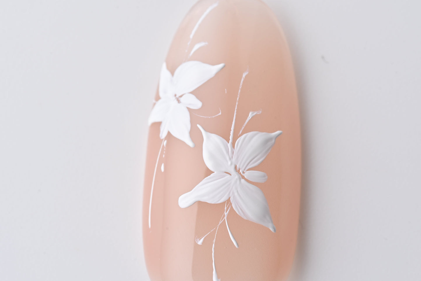 Hand-painted orchid nail art