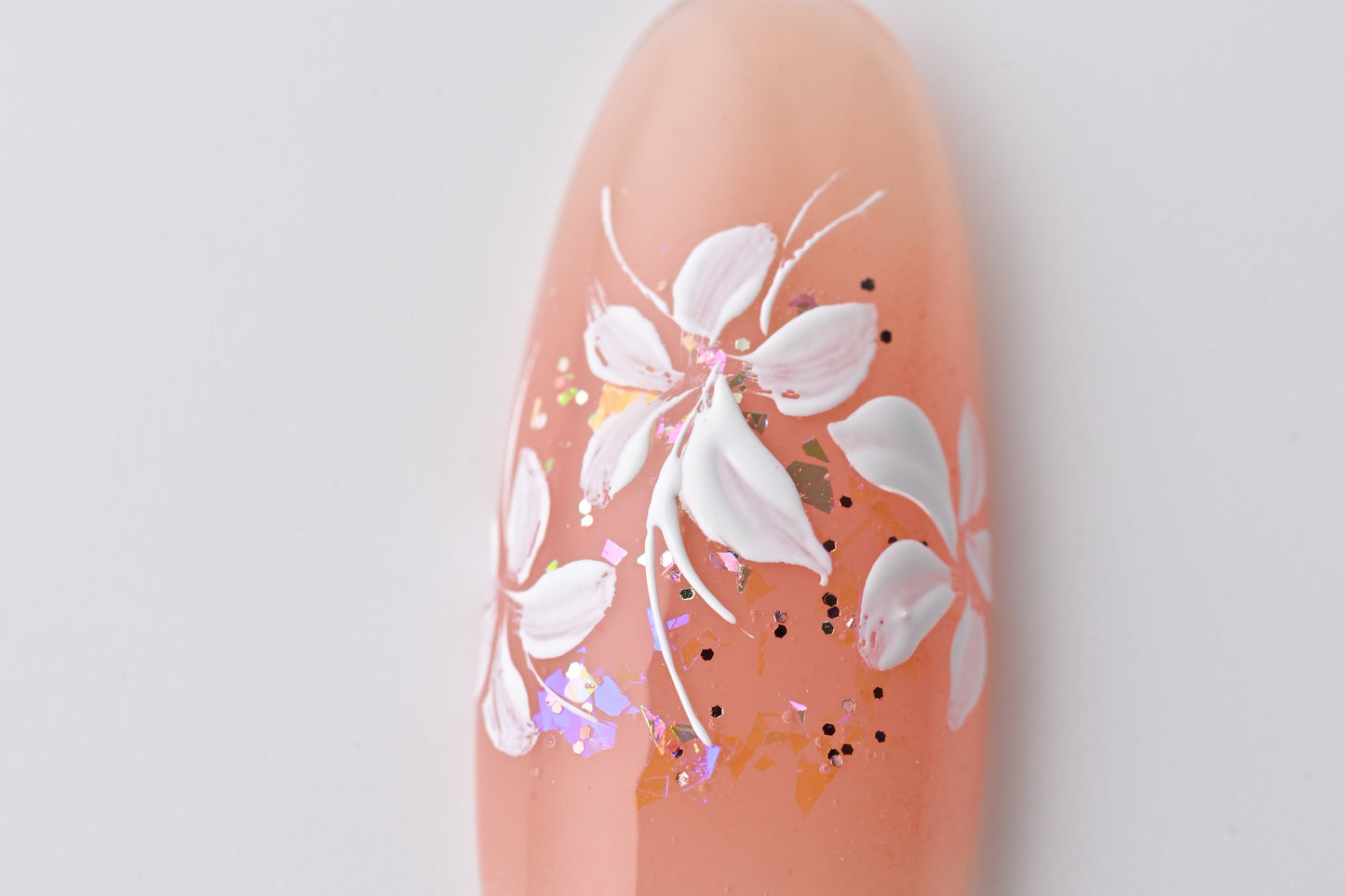 Hand-painted cherry blossom nail art